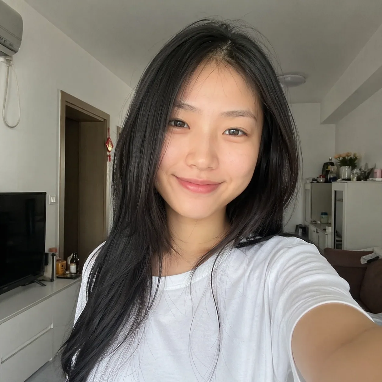 Casual indoor selfie used as the source photo for an image-to-image edit in GPT Image 2